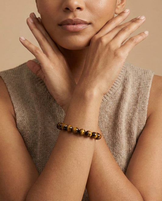 Natural Tiger Eye beaded bracelet featuring 8mm golden-brown chatoyant stones on white background.