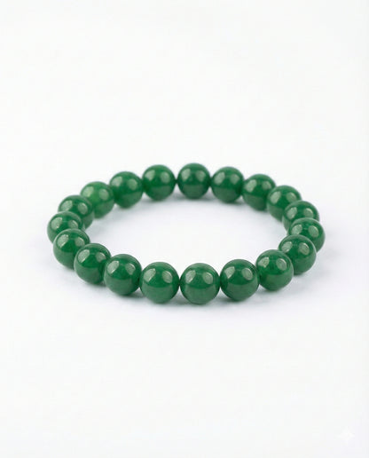 Attract luck and prosperity with this Natural Green Jade beaded bracelet. Handcrafted with premium 8mm green gemstones for harmony and abundance.