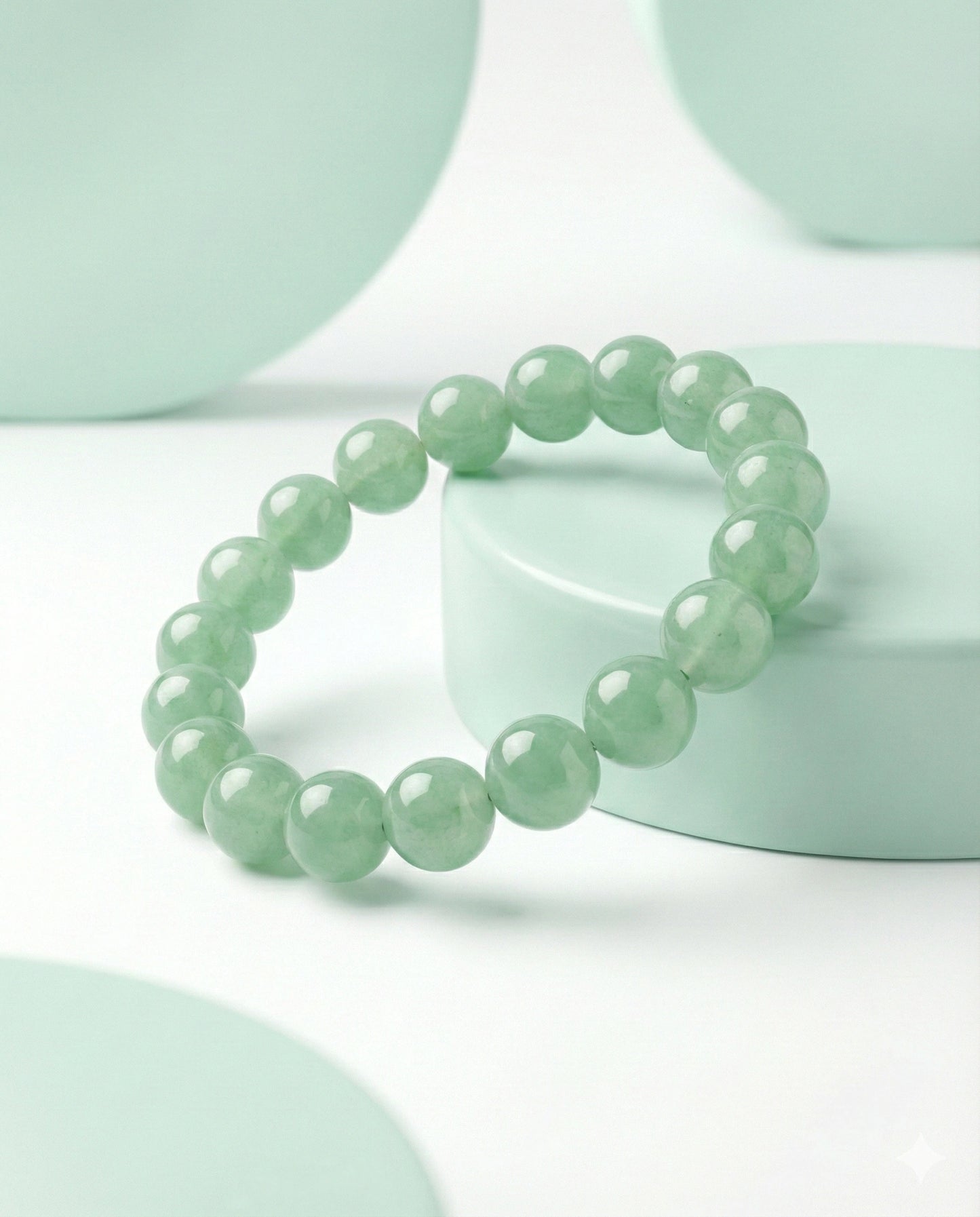 Natural Green Aventurine beaded bracelet featuring 8mm light green translucent stones on white background.