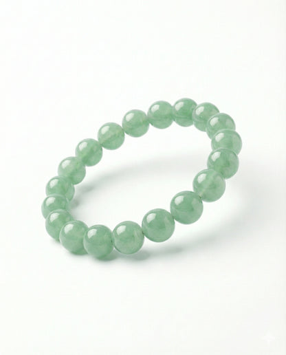 Natural Green Aventurine beaded bracelet featuring 8mm light green translucent stones on white background.